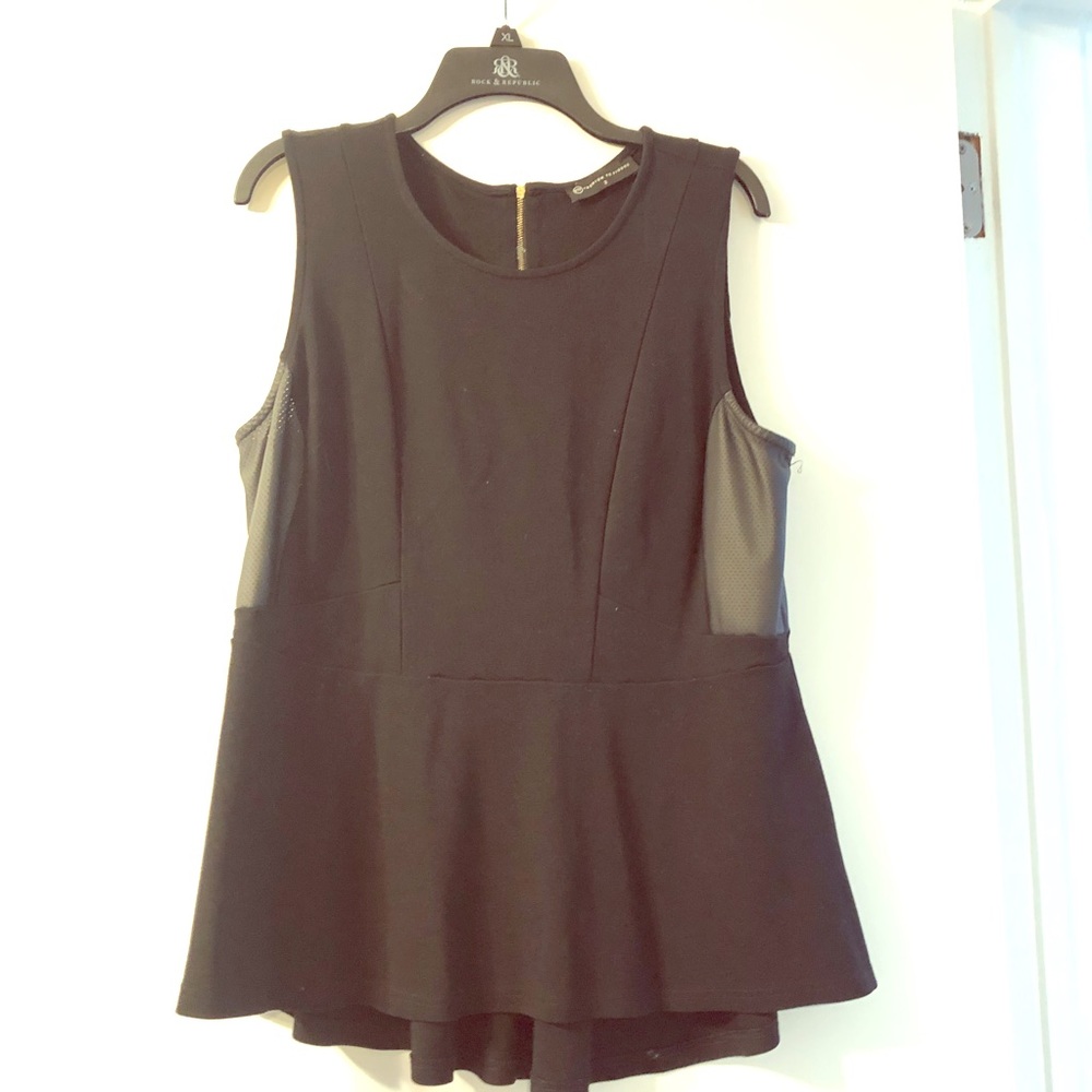 Black and leather sided peplum top